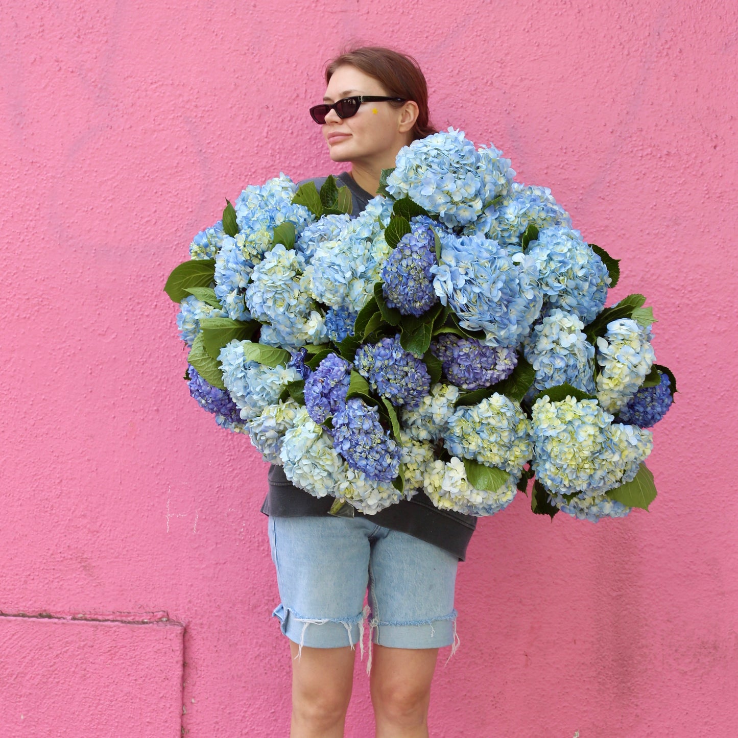 Sapphire Dreams floral arrangement from Pink Clover LA, styled with lush greenery and calming tones
