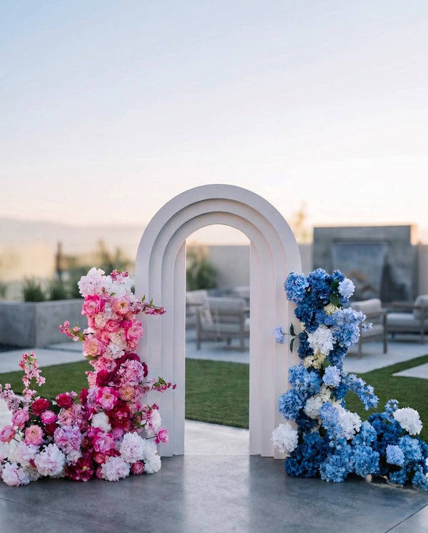 Gender reveal flower arch with pink and blue florals in Los Angeles