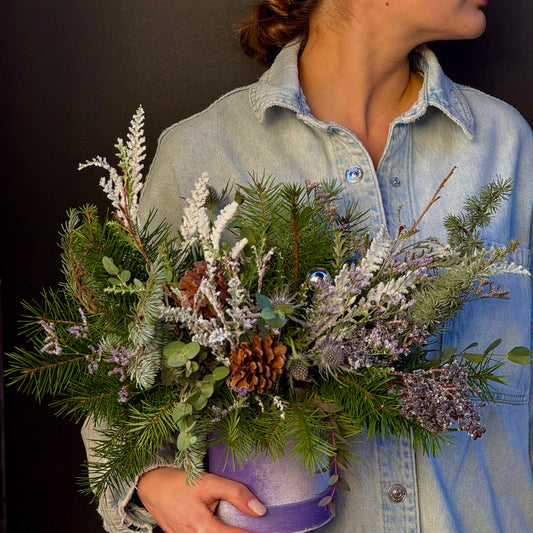 Frosty Cheer floral arrangement from Pink Clover LA, styled with seasonal foliage for festive charm