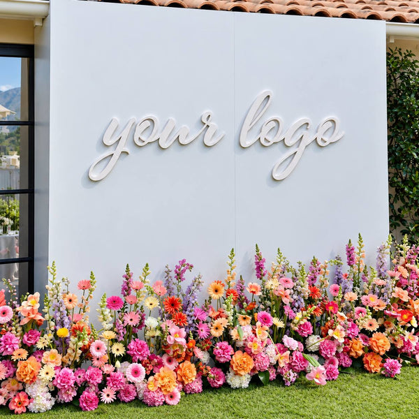 Branded floral wall with client logo, corporate event Los Angeles