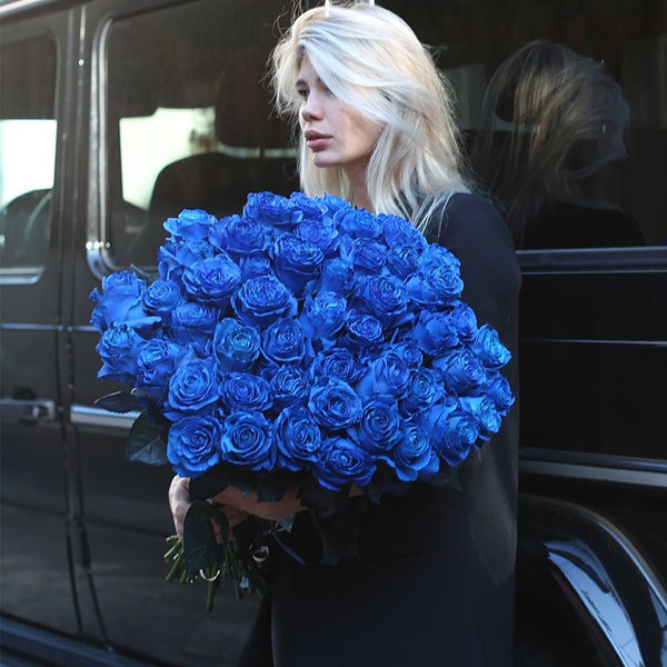 Luxurious Blue Roses bouquet showcasing uniquely dyed blue blooms, beautifully styled for premium fl