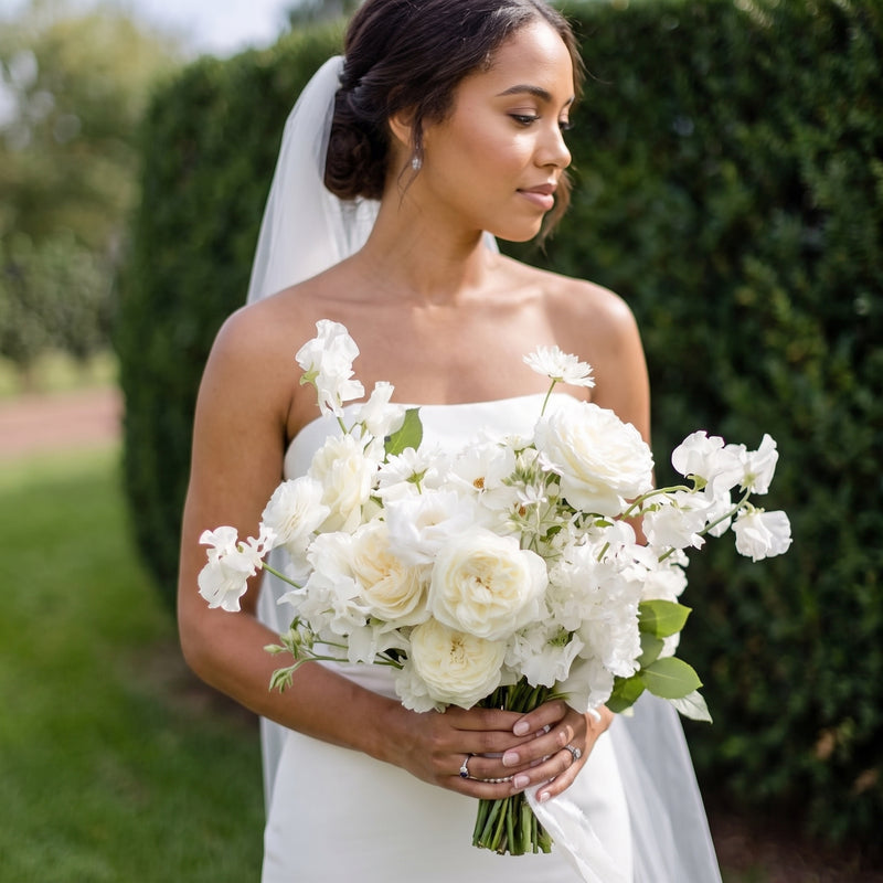 Ivory Garden bridal bouquet of white garden roses and sweet peas held by a bride — Los Angeles wedding florist, Pink Clover