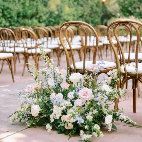 Romantic blush and sage aisle arrangement with garden roses for Los Angeles estate weddings