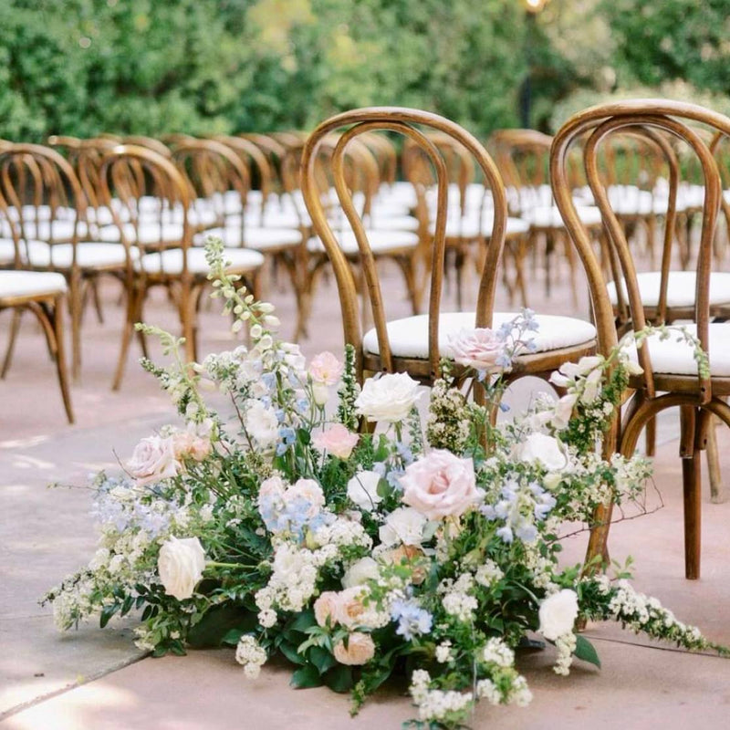 Romantic blush and sage aisle arrangement with garden roses for Los Angeles estate weddings