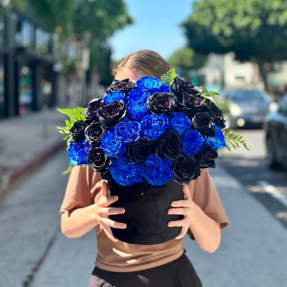 Full-angle view of the Untitled bouquet showcasing layered petals, vibrant hues, and lush foliage, styled for a modern aesthetic.