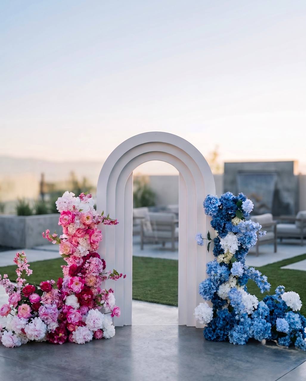 Gender reveal flower arch with pink and blue florals in Los Angeles