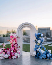 Gender reveal flower arch with pink and blue florals in Los Angeles
