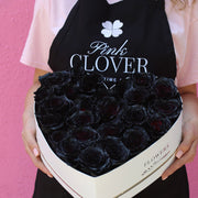 Artisan-crafted Black Heart arrangement featuring velvety black blooms and modern design