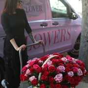 Elegant Valentine’s Day centerpiece with vibrant blooms, designed to elevate any romantic setting.