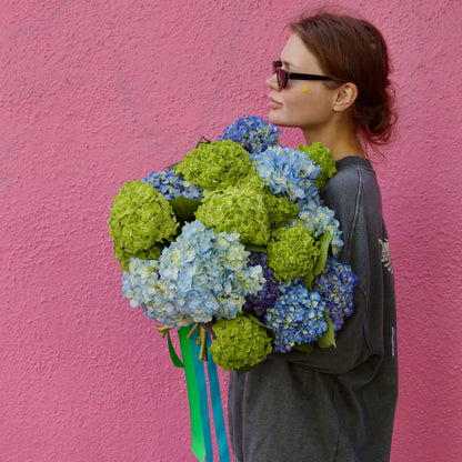Handcrafted bouquet featuring blue and white blooms, perfect for tranquil decor