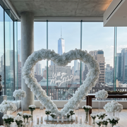 Pink Clover Engagement Heart: white rose arch, hydrangea arrangements for "Will you Marry Me?" proposal Los