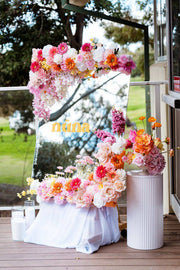 Acrylic welcome sign with pink floral activation, Los Angeles event florist