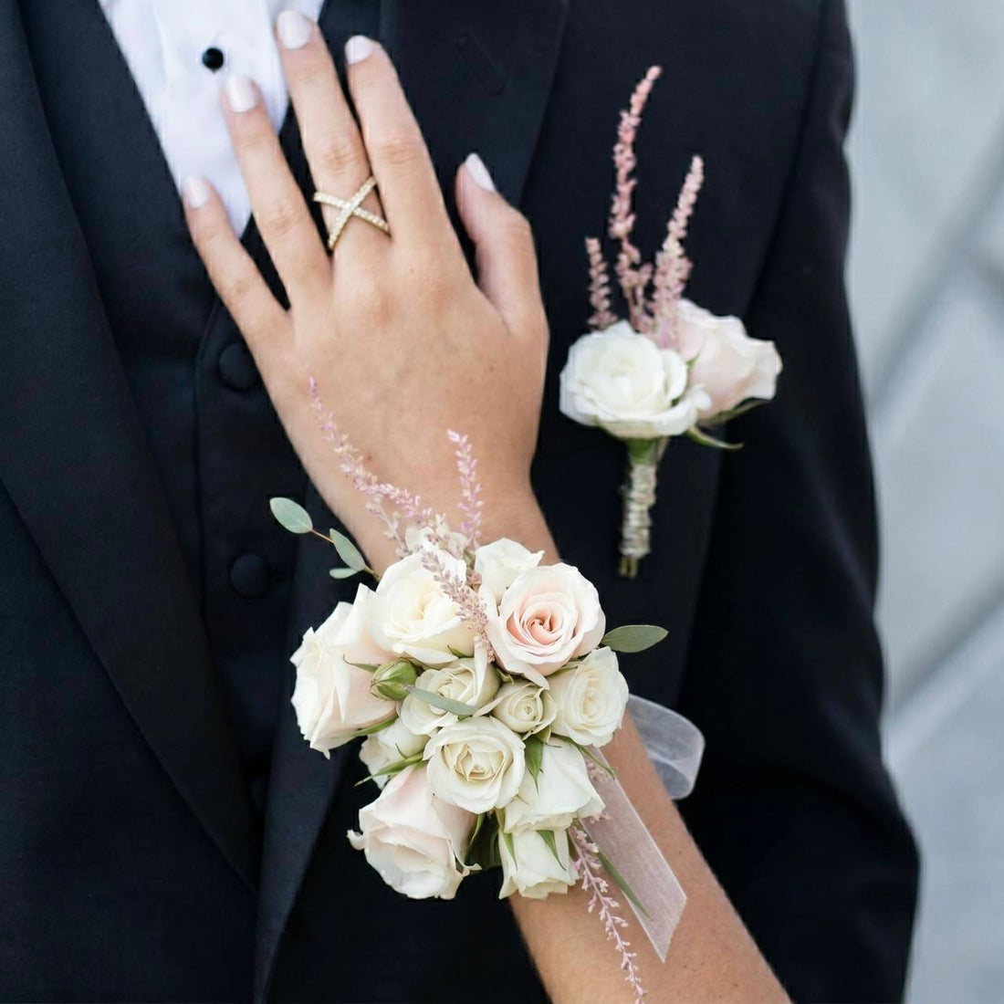 Matching blush rose boutonnière and wrist corsage set — Los Angeles wedding florist