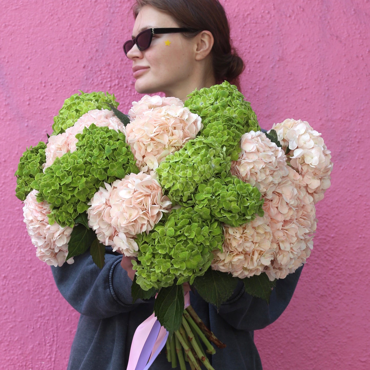 Elegant bouquet of blush flowers with mint accents, ideal for serene celebrations