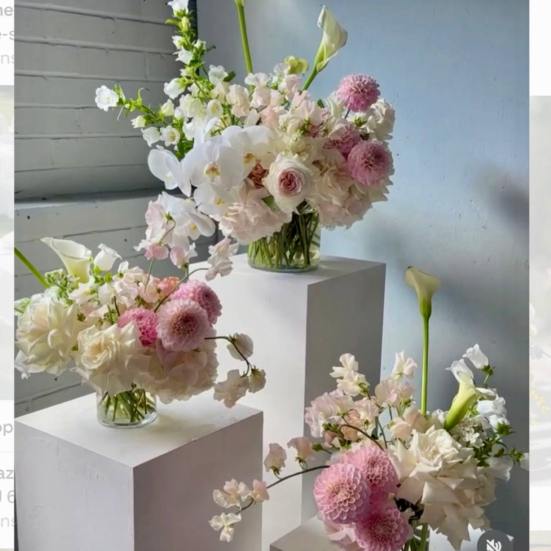 Blush and orchid pedestal collection with dahlias and calla lilies for luxury Los Angeles weddings