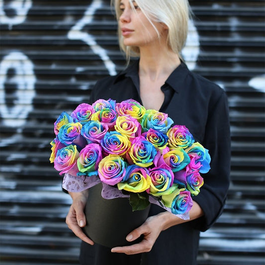 Vibrant Edna bouquet featuring fresh rainbow roses in a decorative gift box – ideal for luxury gifting and romantic occasions