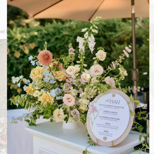 Garden pastel bar centerpiece with dahlias and delphinium for Los Angeles weddings