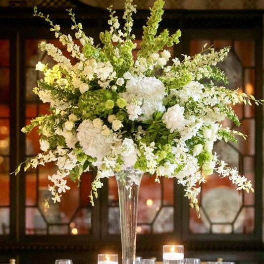 Grand white and green tall centerpiece with hydrangeas and orchids for Los Angeles events