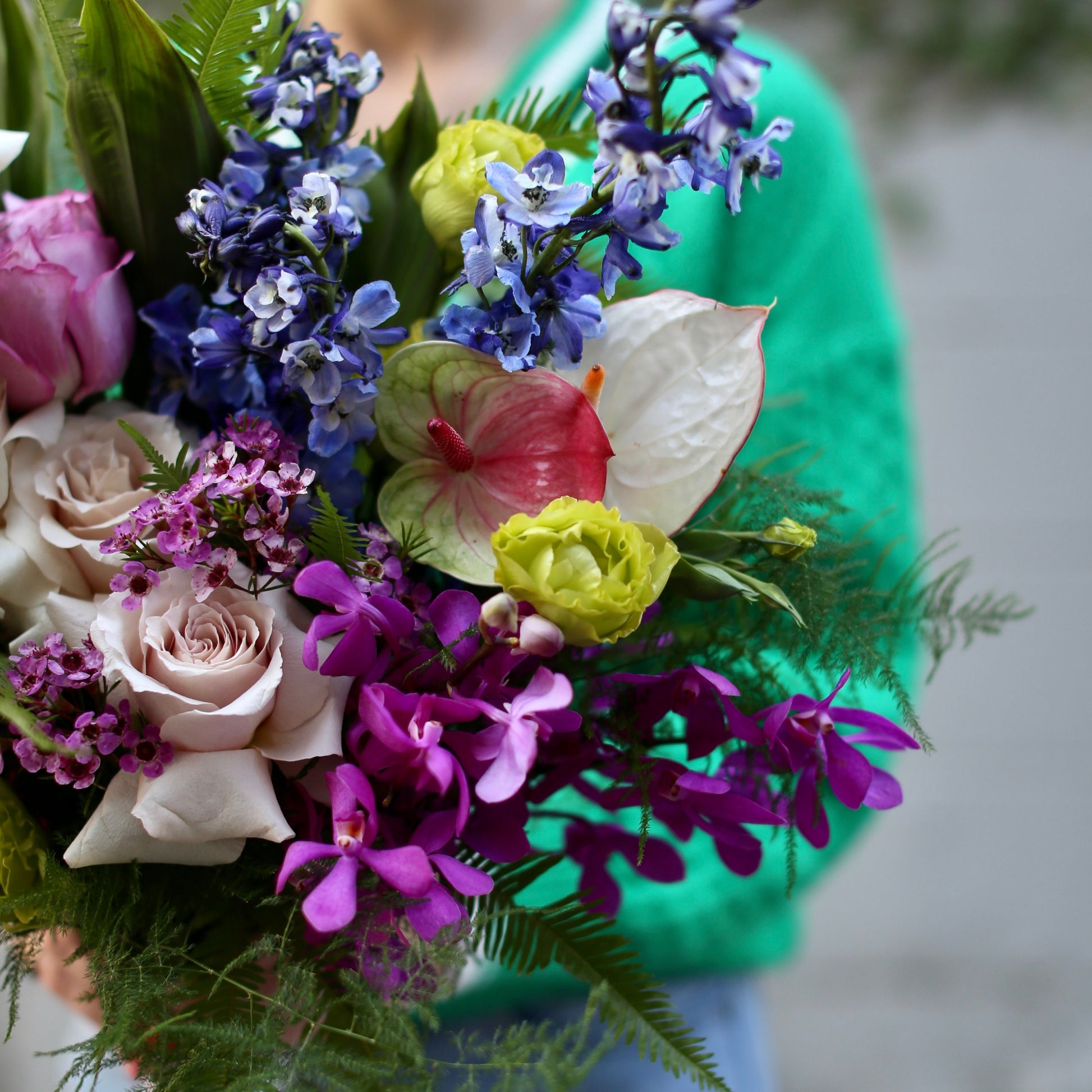 Hand-tied flower bouquet featuring fresh pink and white blooms, styled for a refined and romantic gifting experience