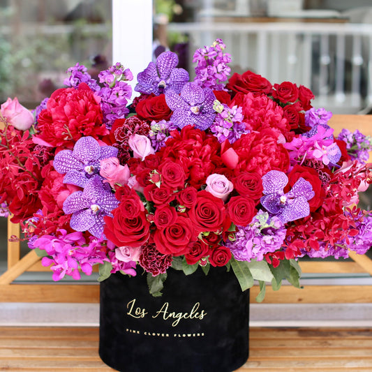 Star lux red roses purple vanda orchids same-day delivery San Francisco