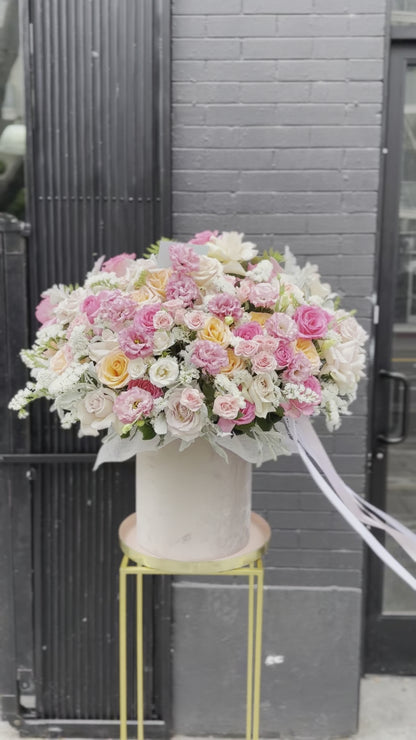 Soft pastel floral arrangement in gentle pinks, ideal for romantic gestures and sentimental occasions.
