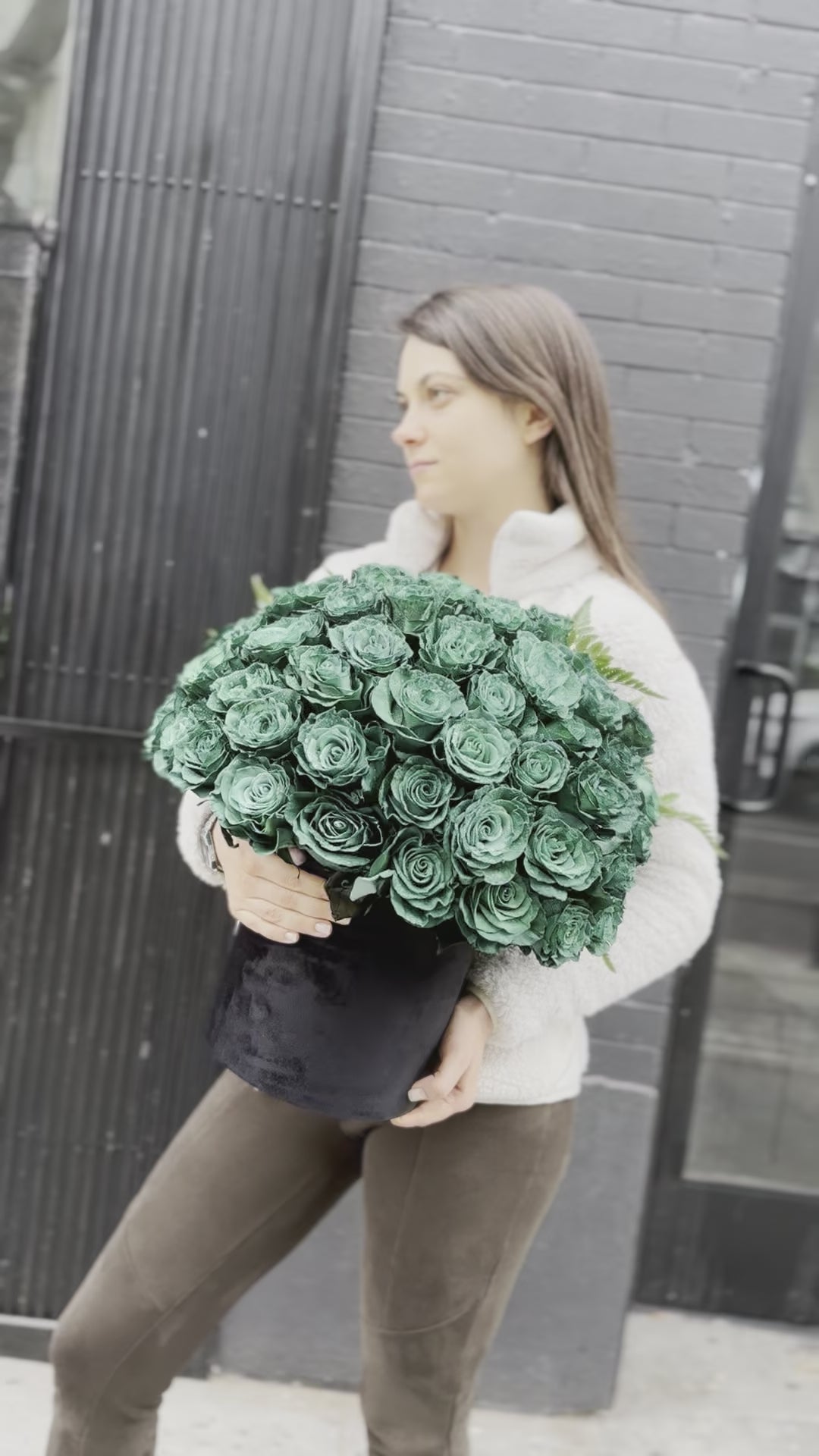 Full view of the Green Roses in Black Velvet Box, styled against a dark backdrop to emphasize the rich color and premium presentation.
