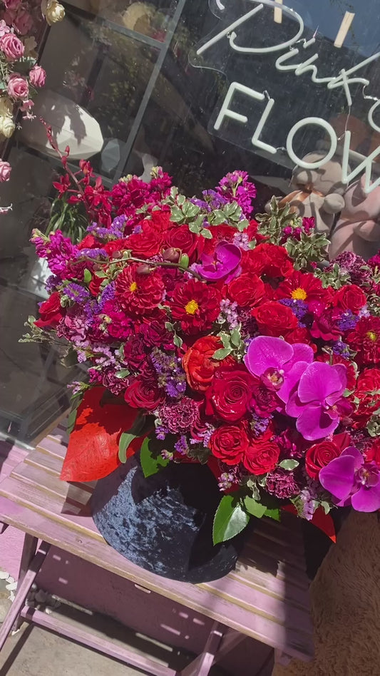 Elegant burgundy rose bouquet styled in a keepsake box, perfect for upscale gifting and luxury home décor