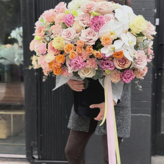 Sweet floral arrangement in soft pink and cream tones, ideal for birthdays and thoughtful gifts.