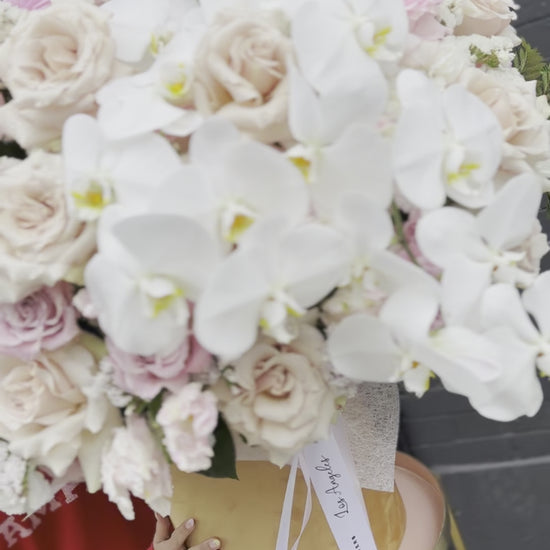 Soft pink and cream floral design in a精致 keepsake box, perfect for birthdays and thoughtful gifts.