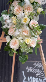 Handcrafted sympathy bouquet with serene white lilies, ideal for honoring cherished memories