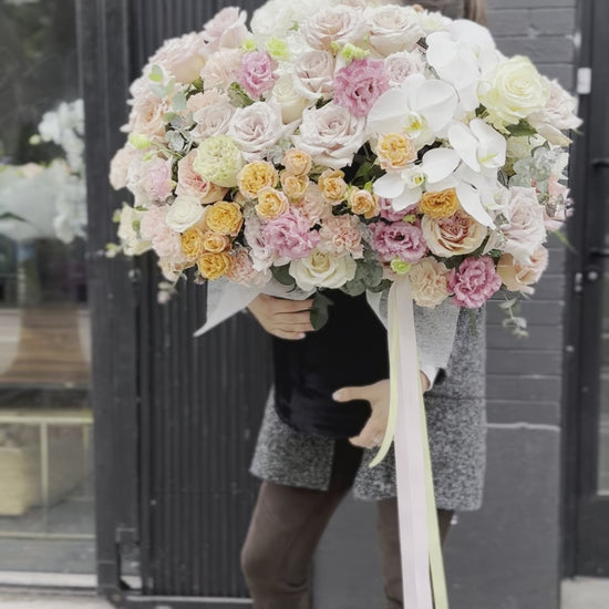 Sweet floral arrangement in soft pink and cream tones, ideal for birthdays and thoughtful gifts.