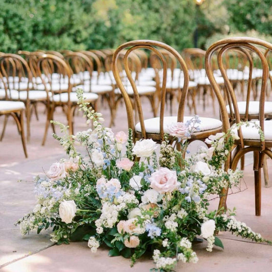 Romantic blush and sage aisle arrangement with garden roses for Los Angeles estate weddings