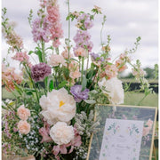 Romantic blush bar centerpiece with pink stocks and peonies for Los Angeles events