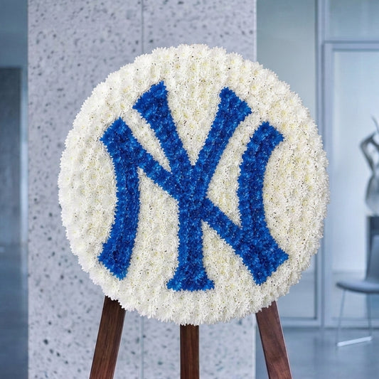 Team Tribute - white funeral wreath with blue NY monogram delivery in Los Angeles by Pink Clover