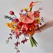 Vibrant tropical bouquet with orchids anthuriums calla lilies and exotic blooms by Pink Clover Flowers Los Angeles