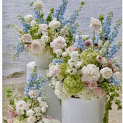 Waterside pastel pedestal floral set with roses and hydrangeas for Los Angeles waterfront weddings