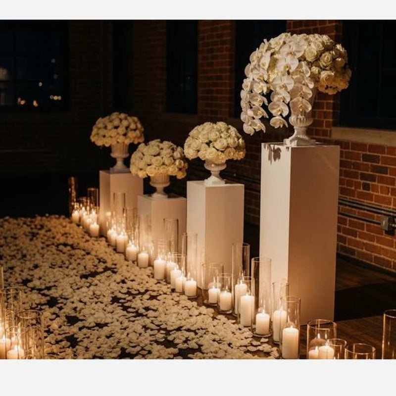 Fresh white rose petal pathway for Los Angeles proposal aisle decor.