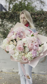 Handcrafted Milana floral gift with fresh blooms presented in a精致 glass vase for a refined and memorable presentation