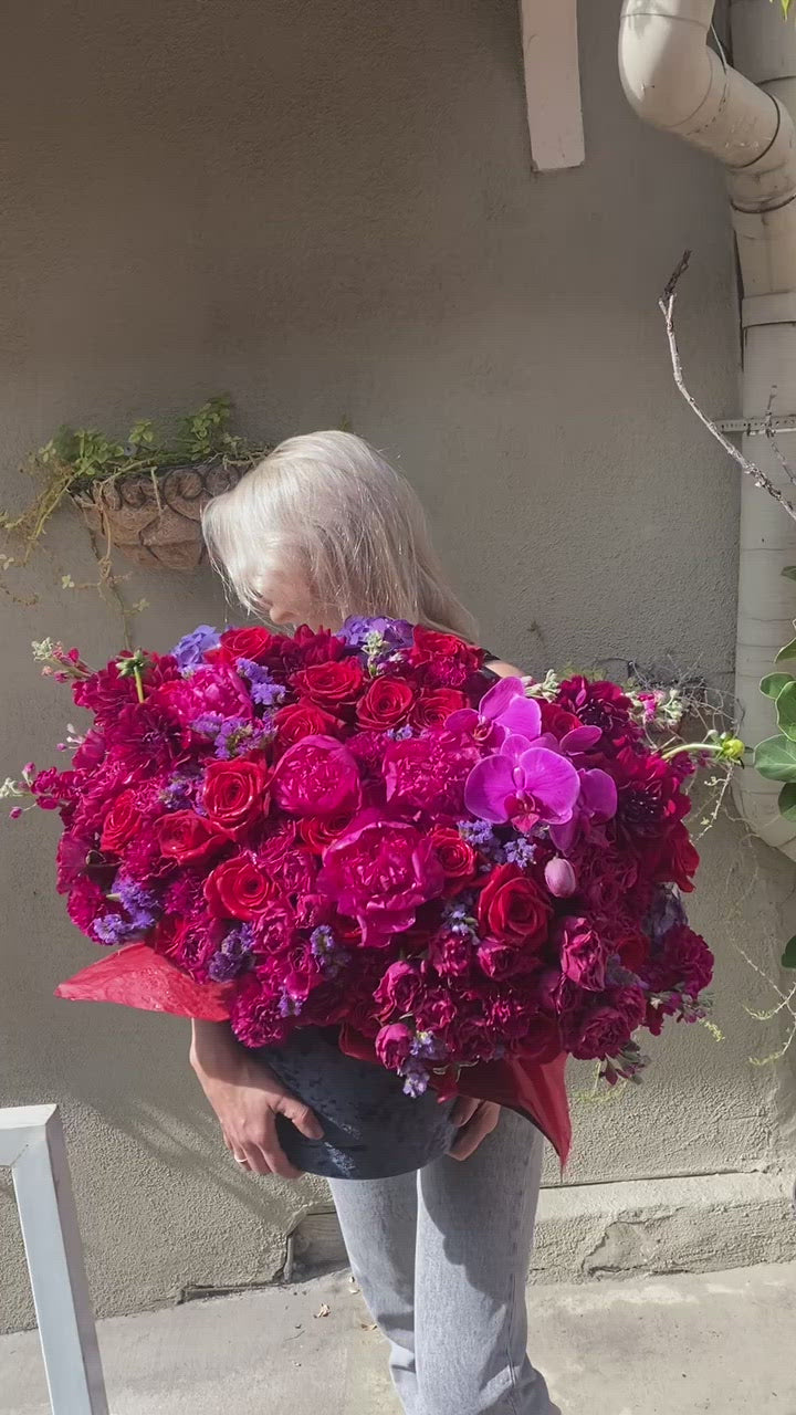 Handcrafted Burgundy Box floral gift with fresh blooms and artistic design, beautifully presented for seasonal celebrations