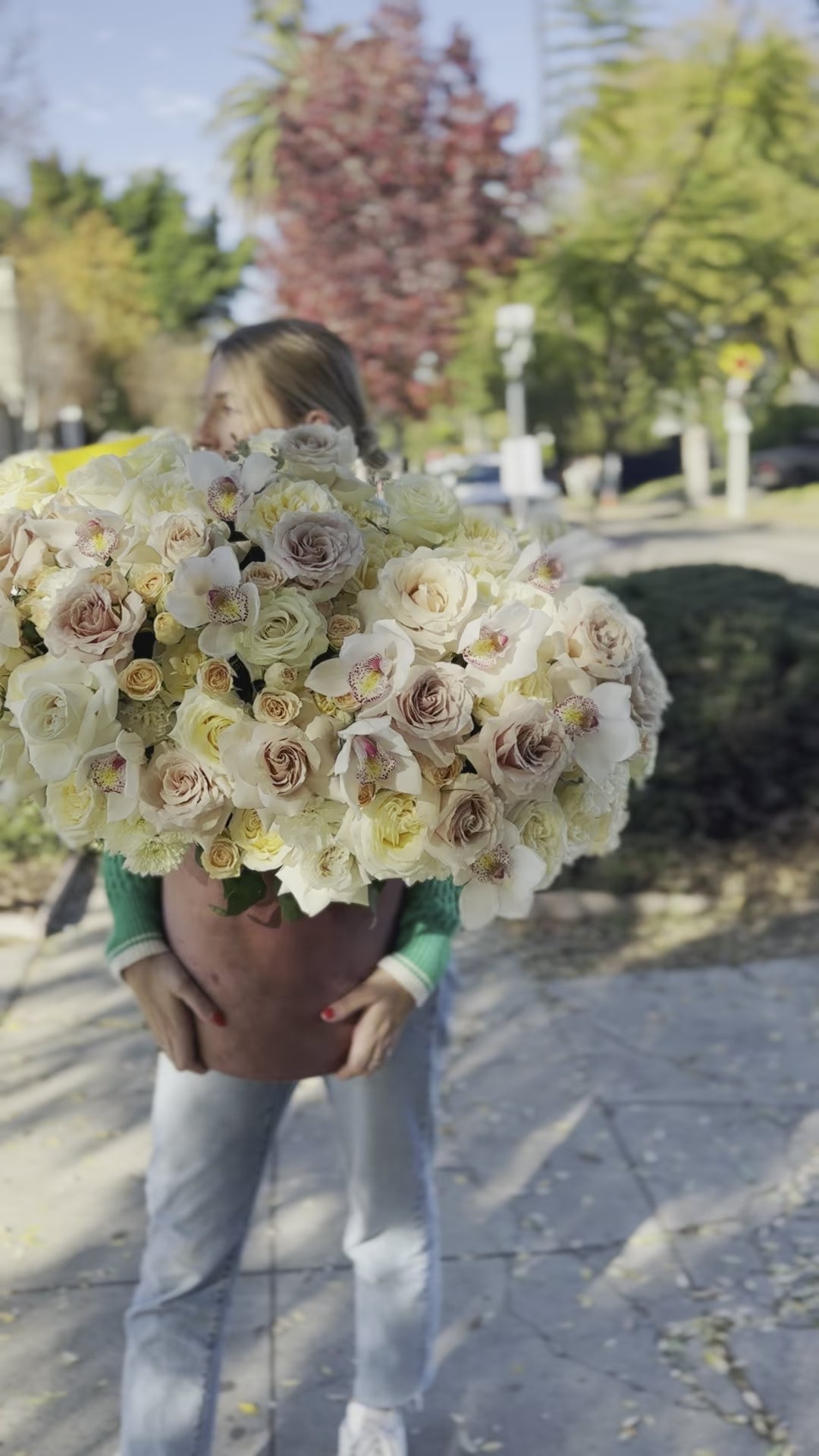 Premium white flower arrangement showcasing pristine blooms in a minimalist yet luxurious presentation