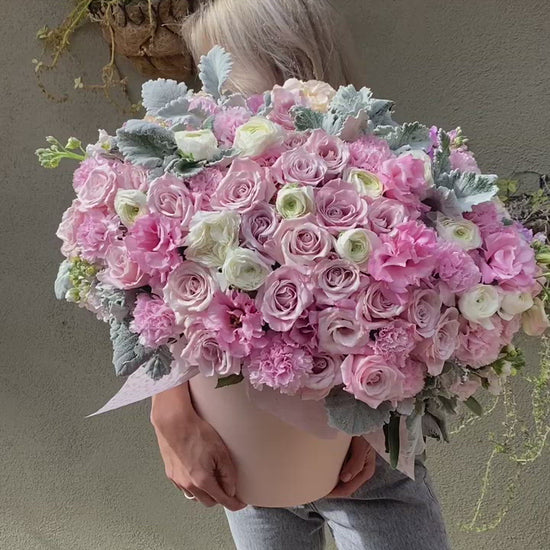 Luxurious Pink Heaven bouquet featuring roses, hydrangeas and ranunculus, beautifully styled for premium floral delivery
