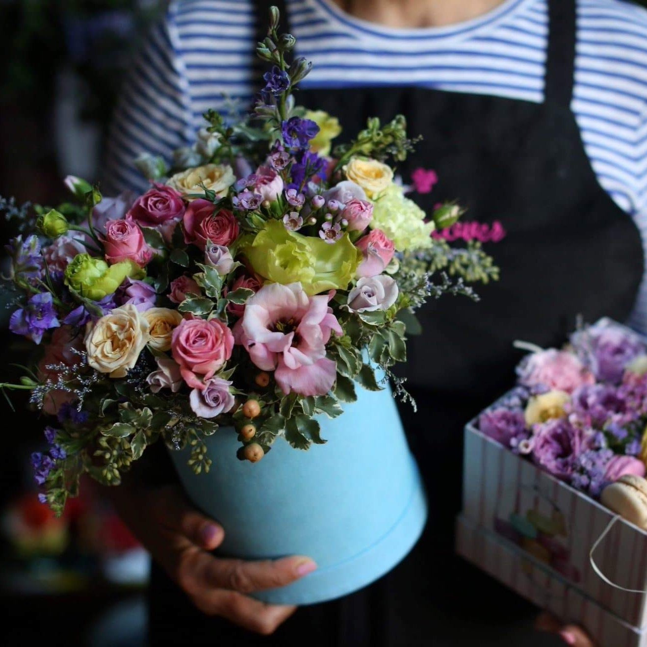 Flowers & Macarons arrangement styled in setting - luxury flower box Los Angeles florist