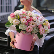 Handcrafted floral gift with ranunculus, lisianthus and white blooms, beautifully arranged in a pastel-themed keepsake box