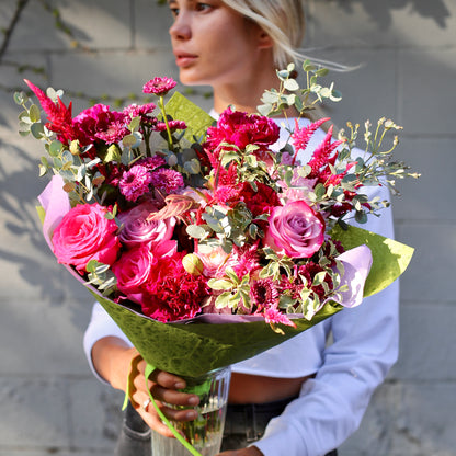 Vibrant purple rose bouquet with fresh seasonal flowers, beautifully styled for romantic occasions and luxury delivery