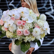 Elegant orchids and garden roses with dahlias bouquet, beautifully arranged in a boxed design for a refined and romantic look