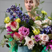 Festive flower gift in a modern box design with bold colors and fresh seasonal blooms, perfect for birthday celebrations