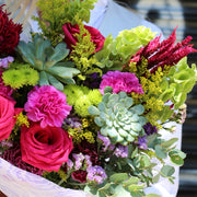 Handcrafted Laura floral gift with roses and succulents, presented in a精致 keepsake design for a refined and memorable look