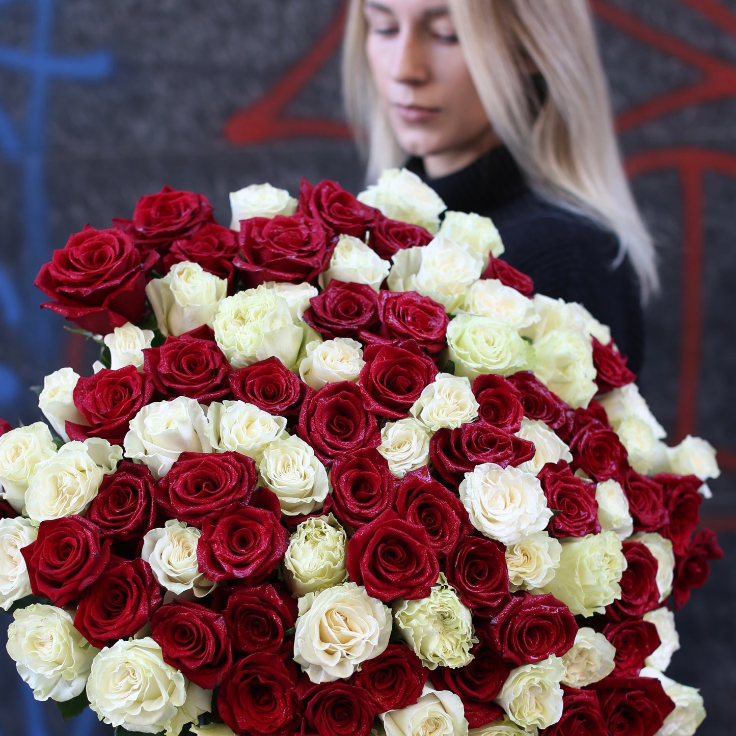 100 Roses arrangement styled in setting - luxury rose Los Angeles florist