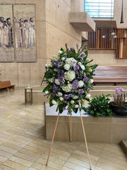 Sympathy spray arrangement styled in setting - luxury funeral spray Los Angeles florist